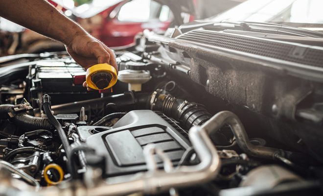 auto-mechanic-working-car-engine-technical-car-inspection-service